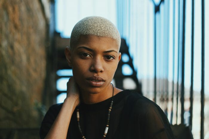 short haired person with bleached hair